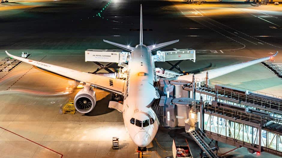 White and Blue Airplane on Airport